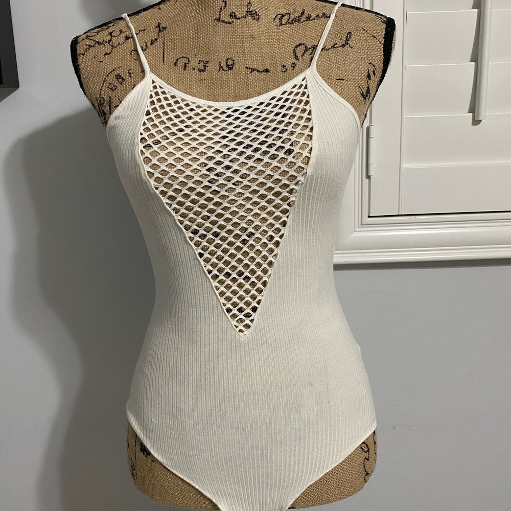 White bodysuit, mesh cut out